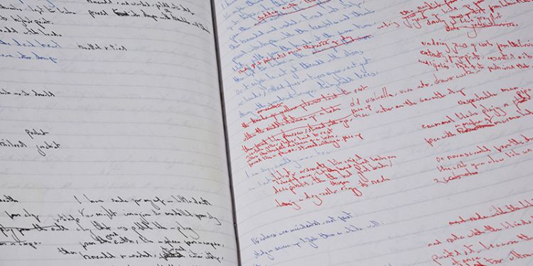 Poetry drafted on to a notebook