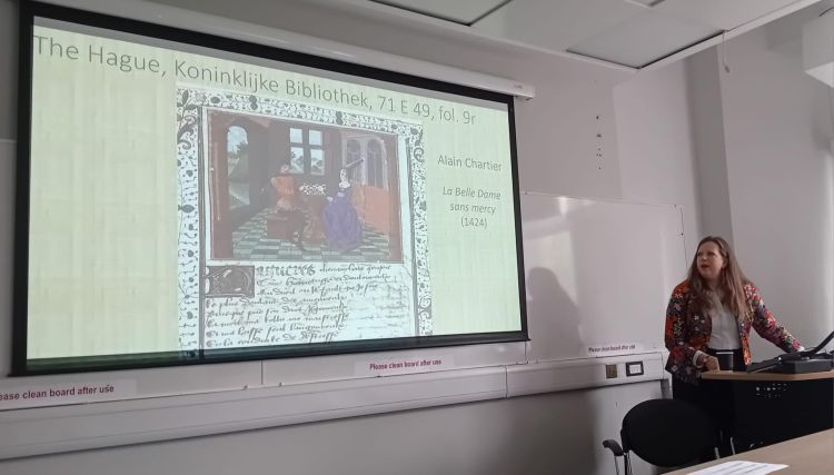 Emma Cayley giving a presentation at a colloquium at the University of Leeds