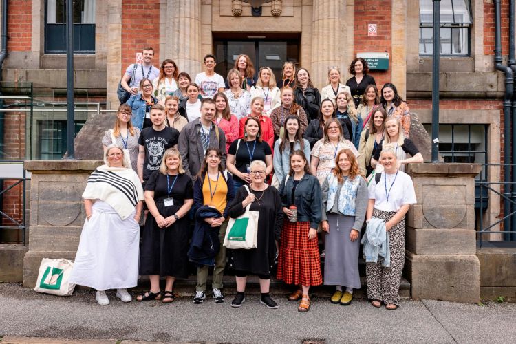 Group of teachers outside the School of Fine Art, History of Art and Cultural Studies at the University of Leeds.