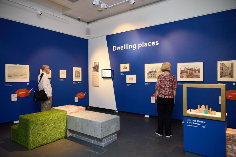 Visitors in an exhibition gallery