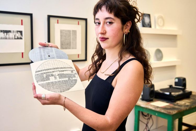 FUAM Graduate Art Prize 2024 winner Ella Georgiou with her work in The Stanley & Audrey Burton Gallery, University of Leeds