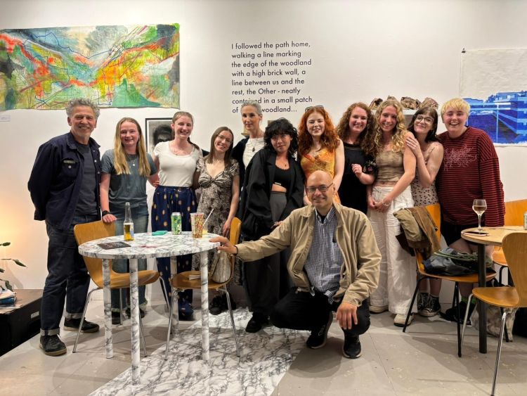 group of people in an exhibition