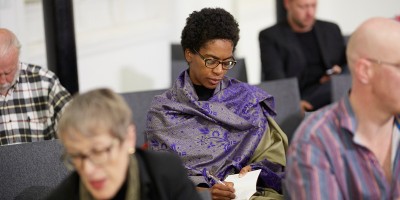 People at a history talk