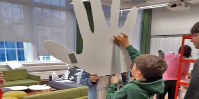 Young people working in an arts-based activity.