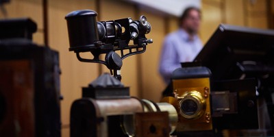 Lecture being delivered with archives in the foreground