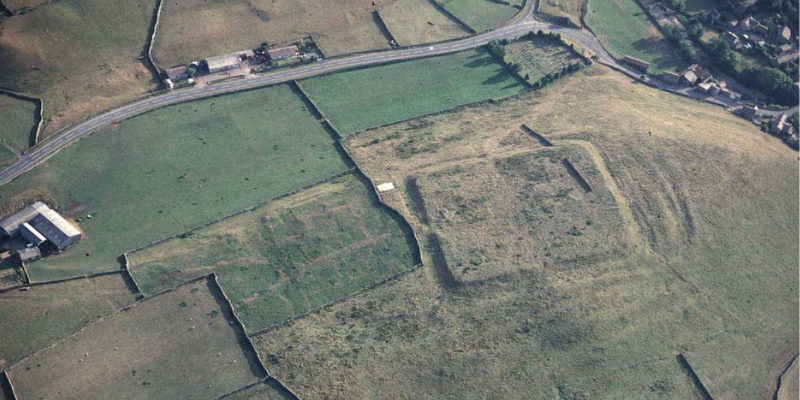 Aerial photograph of Brough Hill, showing the outline of the Roman fort
Aerial photograph of Brough Hill, showing the Roman fort. Picture credit: Robert White, Yorkshire Dales National Park Authority