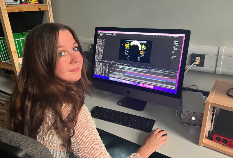 Hannah editing a scene from Light can Also Rhyme on Adobe After Effects