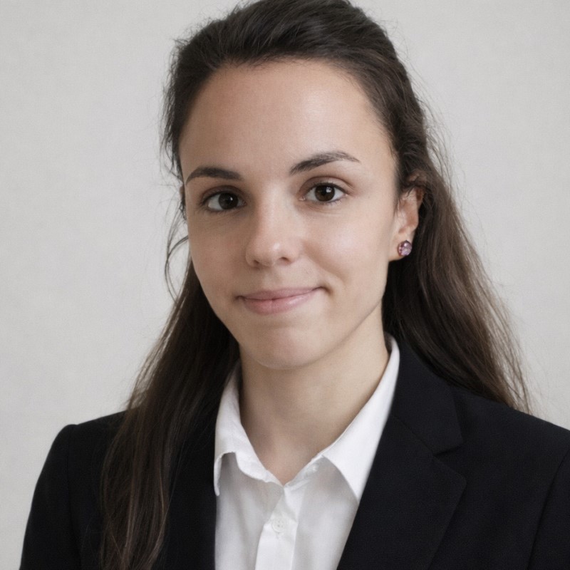 A woman looks at the camera