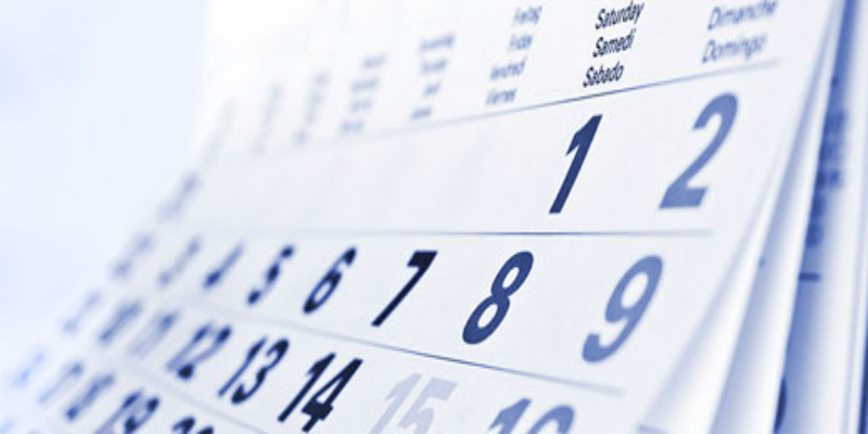 A picture of a calendar with blue numbers and a white background.