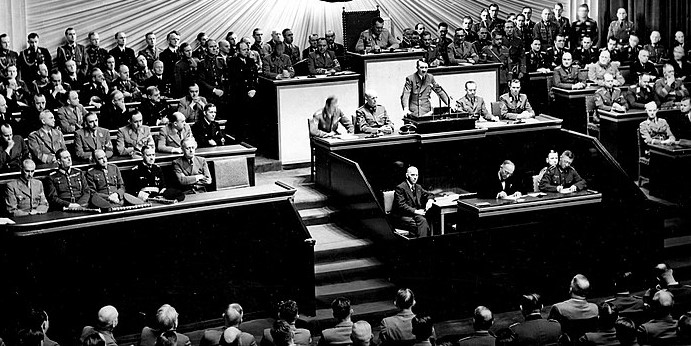 Adolf Hitler delivers a speech at the Kroll Opera House to the Reichstag on the subject of Roosevelt and the war in the Pacific, declaring war on the United States. German Federal Archives, Bild 183-1987-0703-507. Image via Wikimedia Commons.