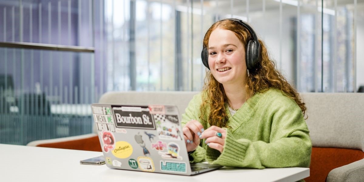 Student watching a webinar