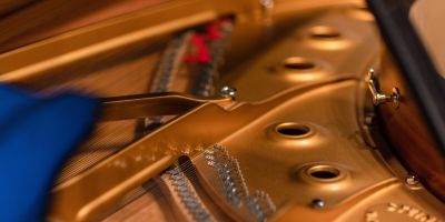 Detail of the inside of one of the School of Music's Steinway pianos.