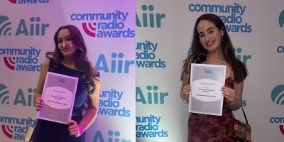 Olivia and Emma holding their silver awards.