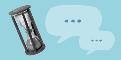Cut out of an antique hourglass next to two speech bubble on a pale blue background