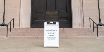 Photograph of 'closed' sign outside the National Gallery of Art in Washington DC