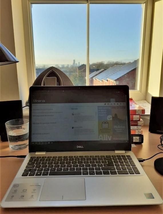 Photo of laptop and window