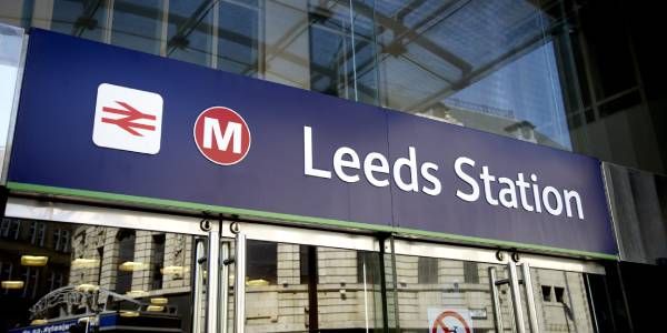 A sign above the entrance of Leeds Train Station