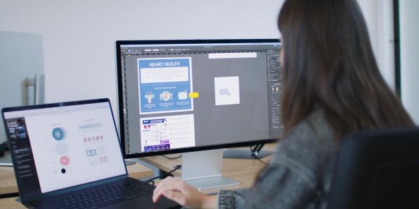 women at laptop designing