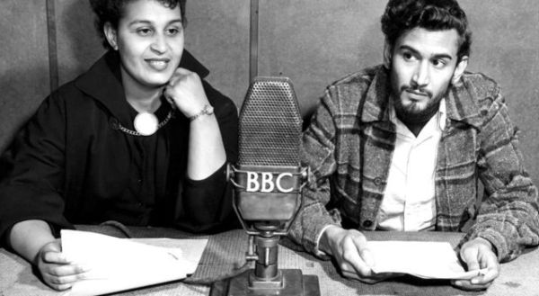 Pauline Henriques and Samuel Selvon reading a story during the weekly BBC Caribbean Service Caribbean Voices programme in 1952