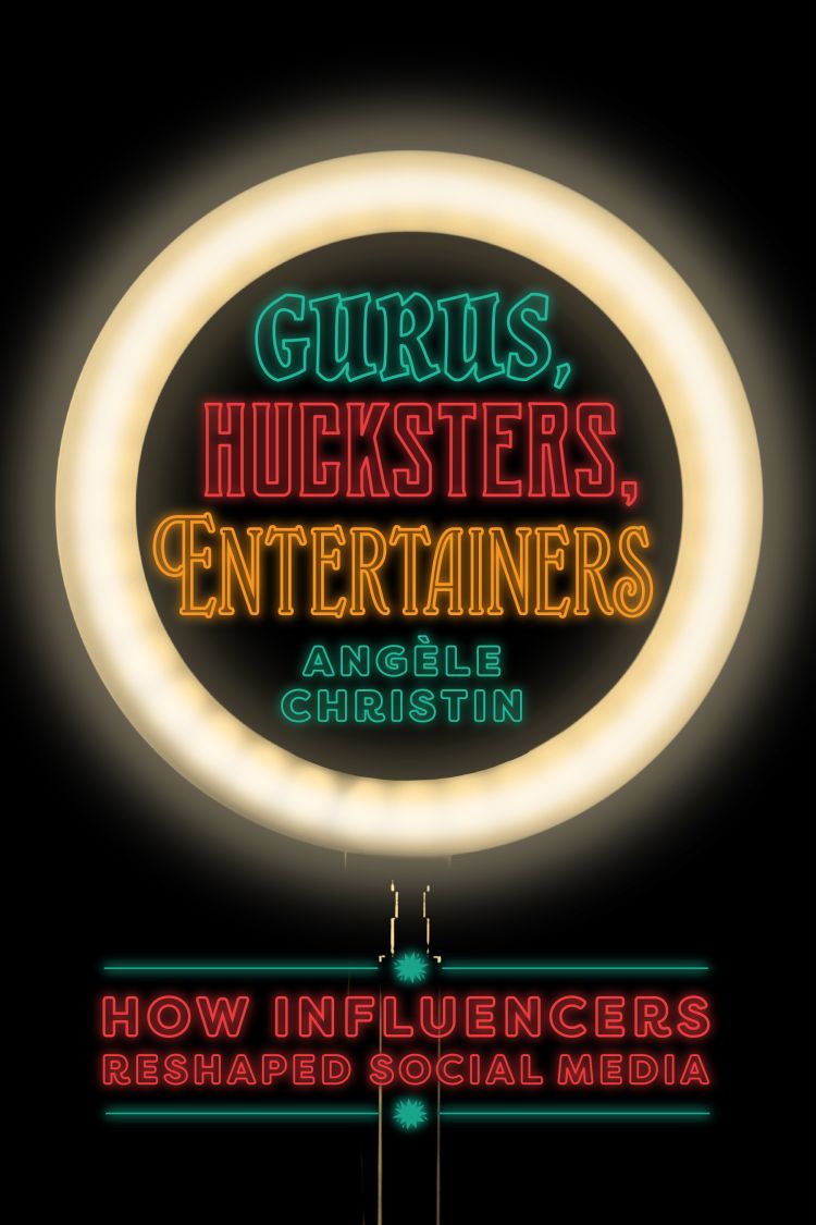 Book jacket: multi-coloured text on a black background with a white circle around the text