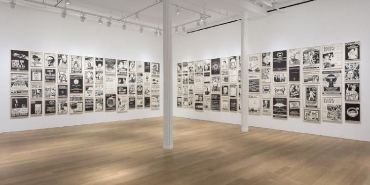 Photo of a gallery with work by Fernando Bryce titled The Decade Review.