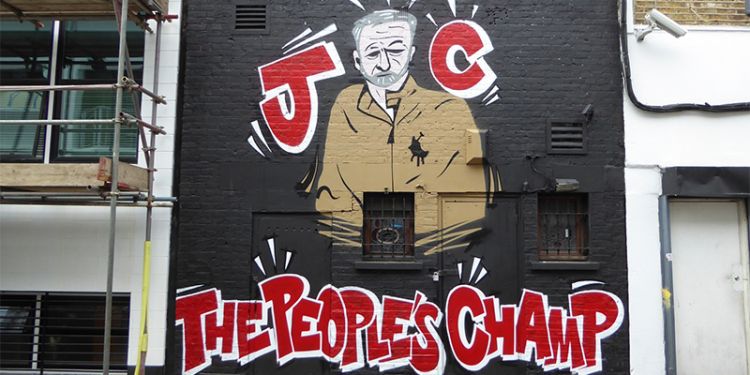 Graffiti picture of Jeremy Corbyn with the caption JC the people&#039;s champ