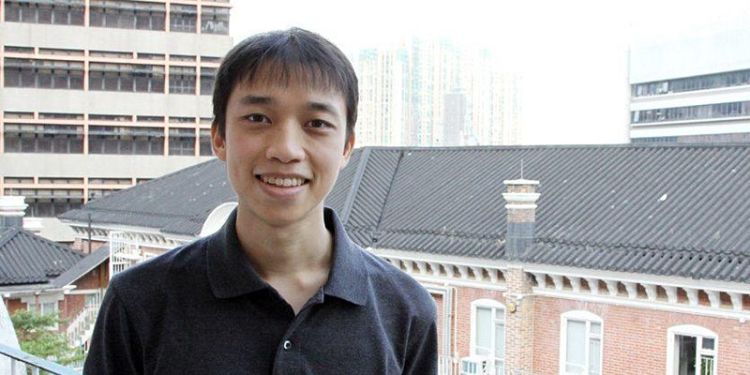 Jonathan hui head and shoulders shot against urban backdrop