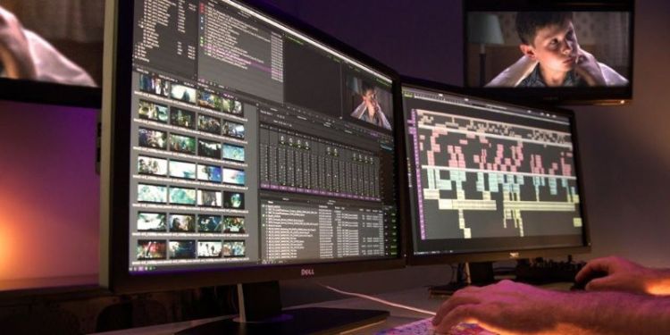 Multiple computer screens in an editing suite