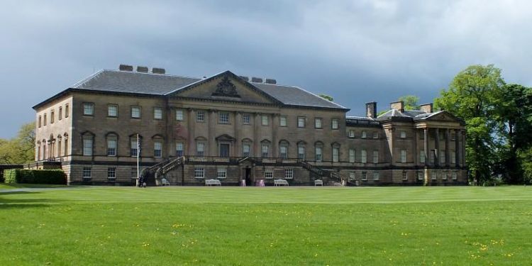 Photo of Nostell on a cloudy day, a Georgian House in parkland owned by the National Trust.