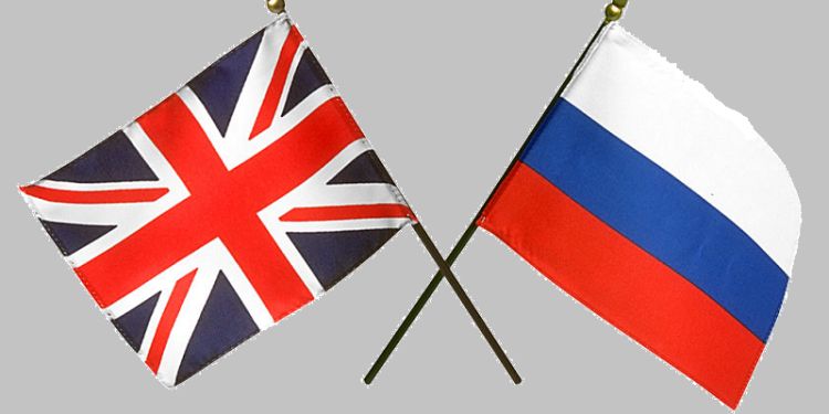 The flags of the UK and Russia