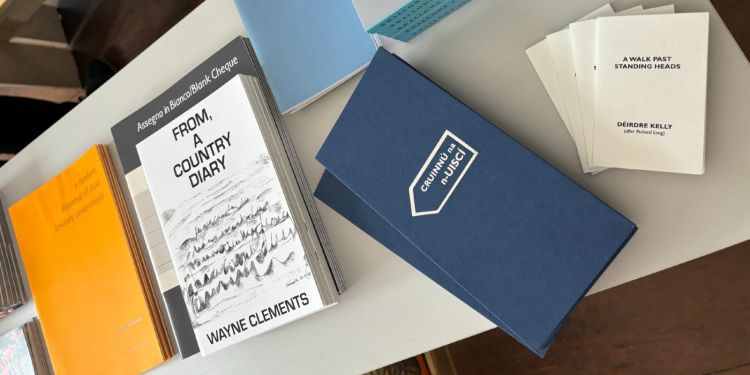 A range of artist books on a table