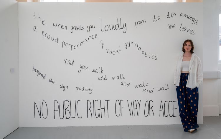 Artist Isobel Richards in a gallery