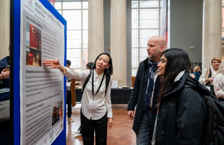 Dr Jieun Kim, Associate Professor of East Asian Studies in the School of Languages, Cultures and Societies, by the display on her research project, ‘Blood Donation and Contested Belonging in East Asia.’