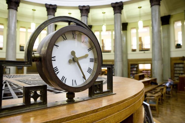 A clock in the centre of The Brotherton Library