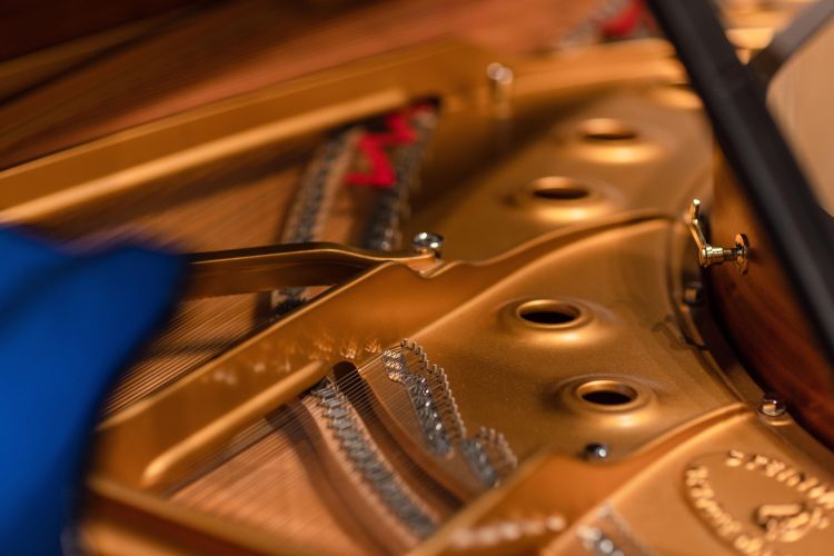 Detail of the inside of one of the School of Music's Steinway pianos.