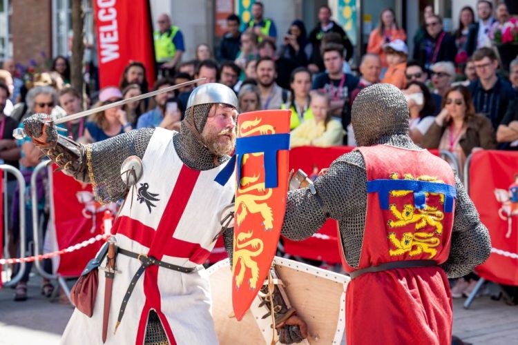 Medieval knights clash swords on campus