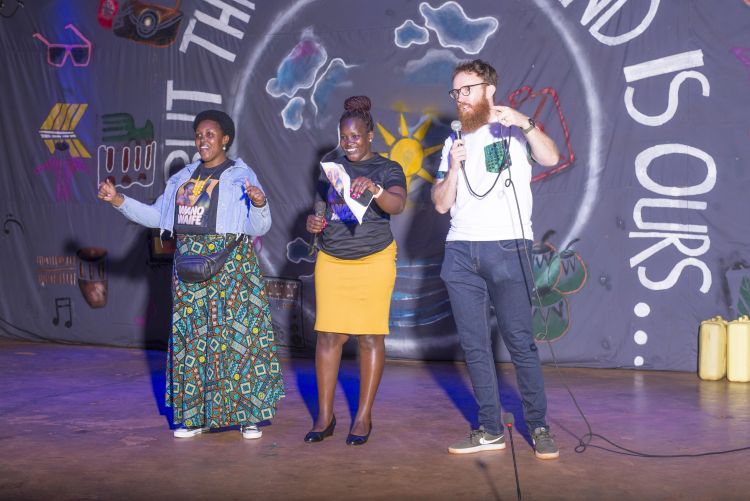 Three people on stage