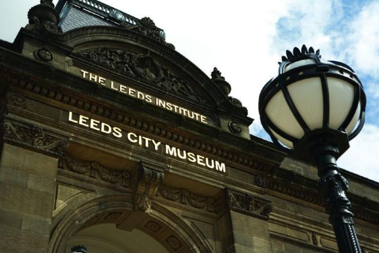 The entrance to Leeds City Museum with lamppost