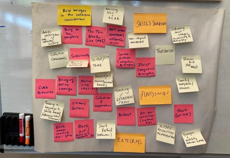 Post it notes on a notice board