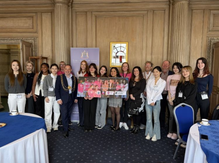 Students stand with the Lord Mayor of Leeds