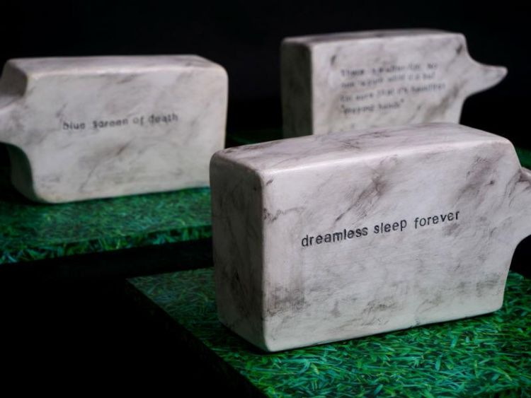 Sculptures cast in plaster by D&#039;arcy Darilmaz, entitled Grave Remarks