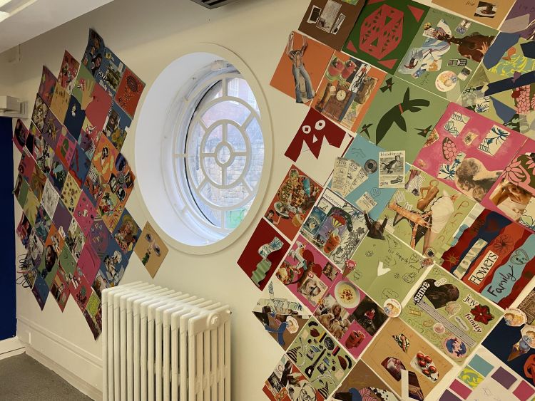 Collages creating a communal tessellating wallpaper pattern on a wall with a round window