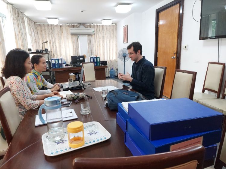 Dr Sean Fear working with the Curatorial Team in the Independence Palace Museum