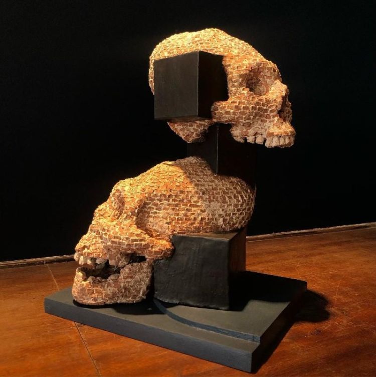 Terracotta sculpture by artist Cesar Cornejo.