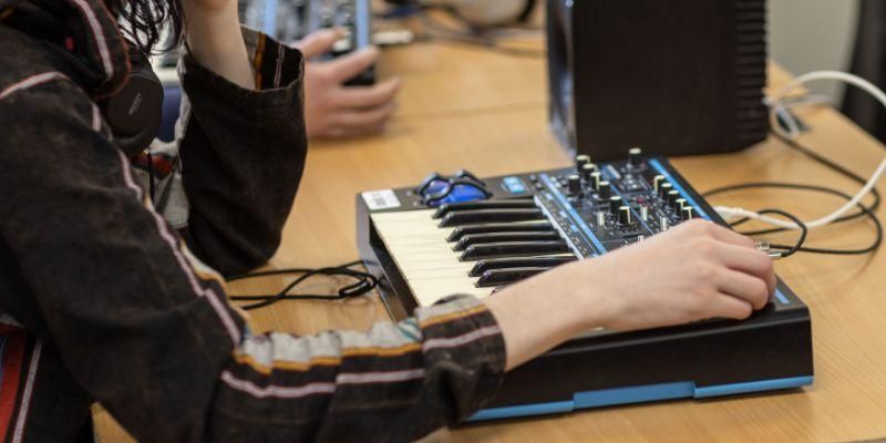 Student using a synthesiser during a workshop in the School of Music's Multimedia Cluster.