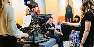 Students in a TV recording studio