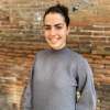 Image of student looking at camera and smiling.