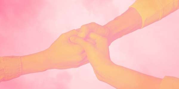 Three hands clasped together