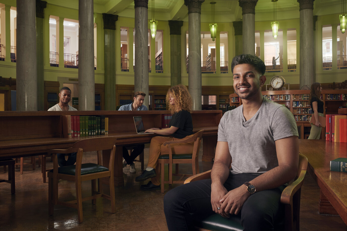 Student facing the camera in the Brotherton Library