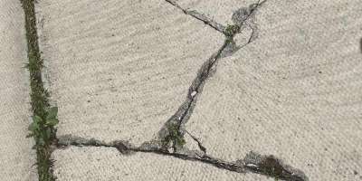 Photo of cracks in pavement